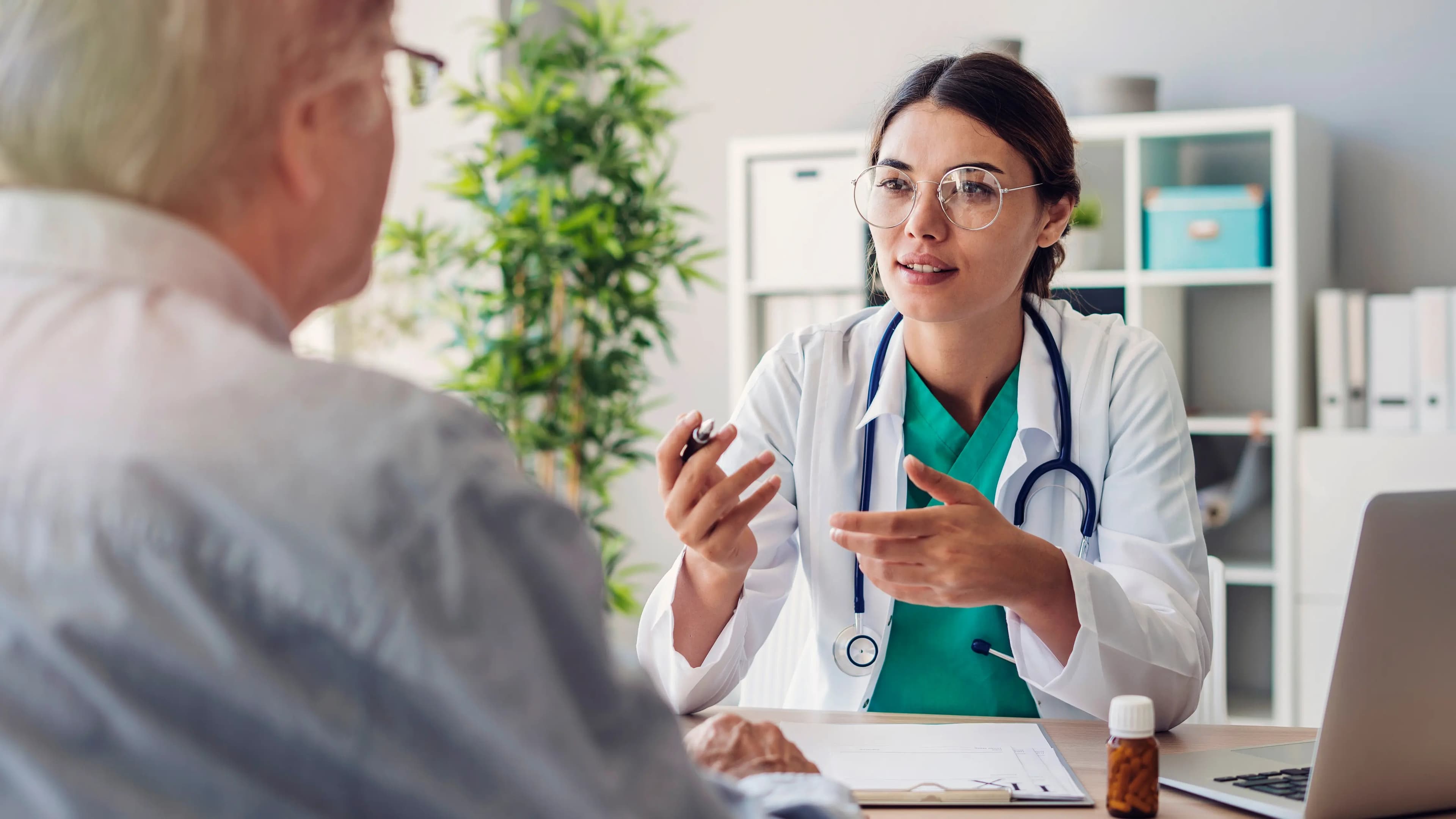 Clinician discussing an orthopedic recovery plan with a patient